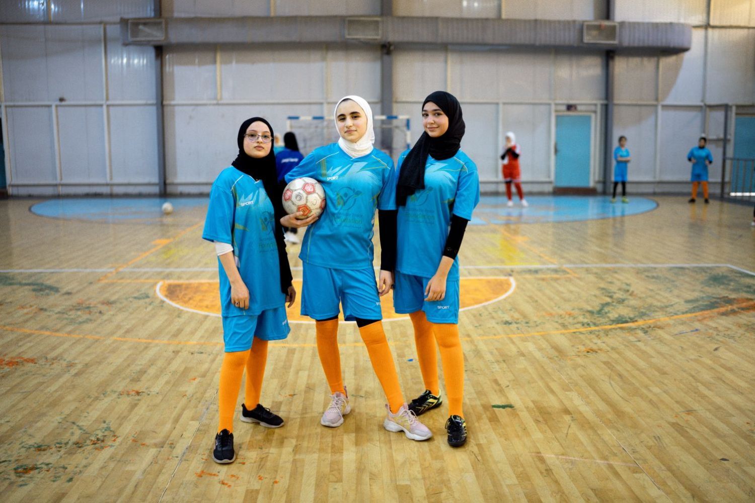 Formerly displaced Iraqi teenagers in a community soccer program