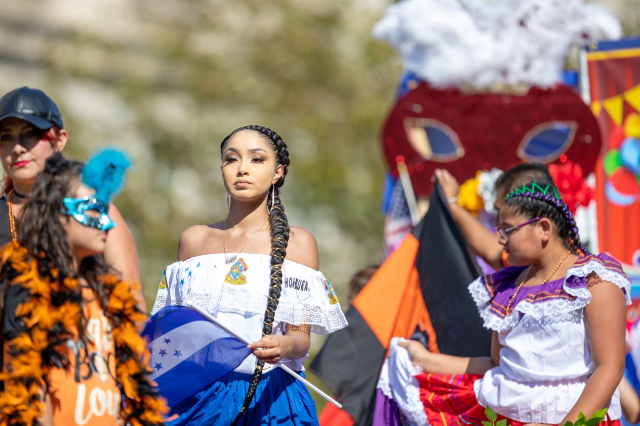 A woman from Honduras in a parade in Washington, DC.