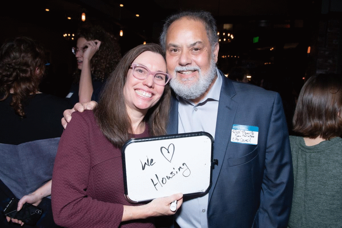 A collection of photos from NPH's holiday member party. People are smiling and holding drinks and signs that explain why they love affordable housing.