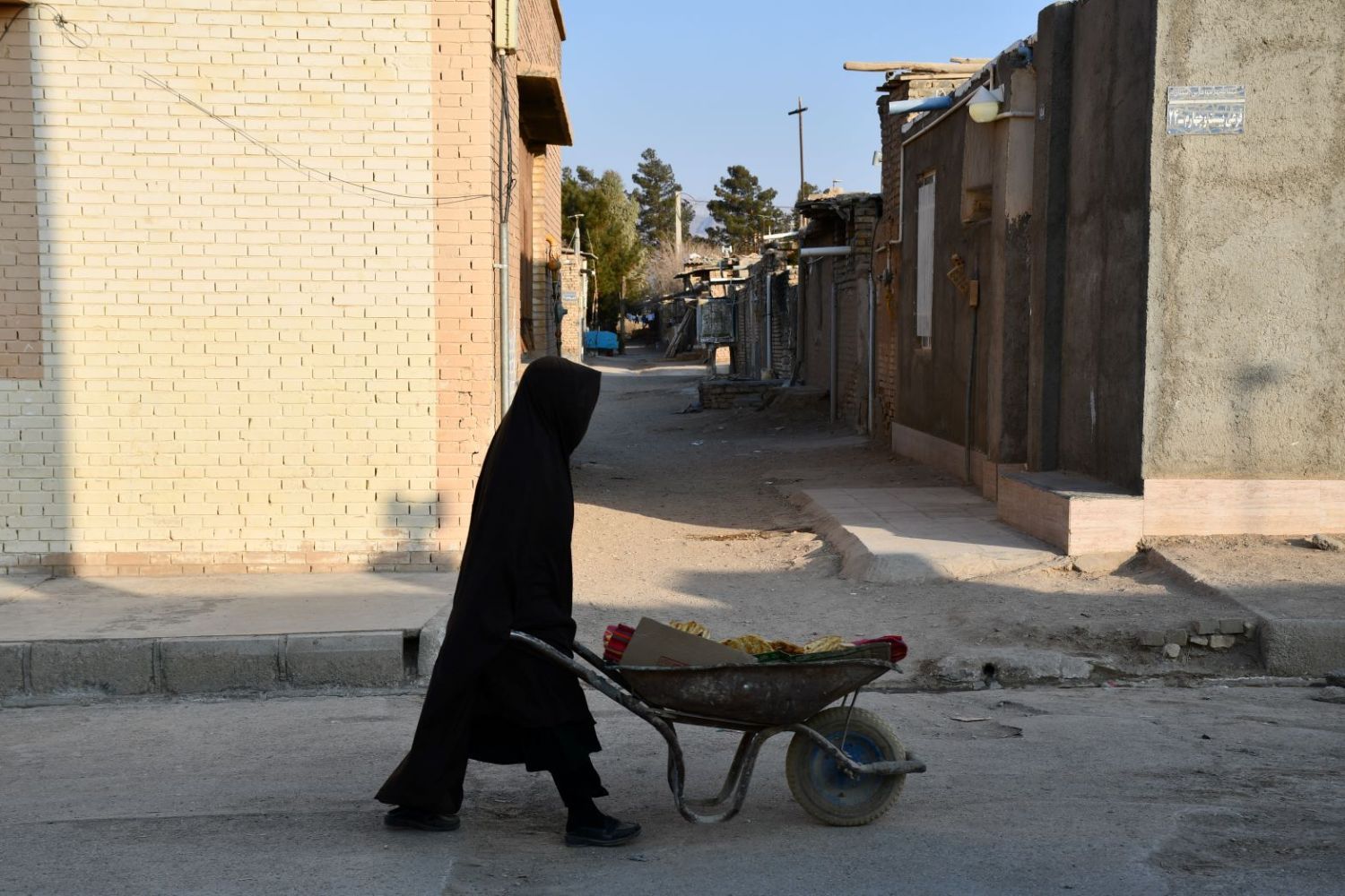 An Afghan woman in the Semnan refugee settlement in Iran