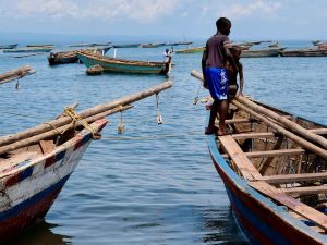 Boys on a fishing boat on the shores of Lake Tanganyika.