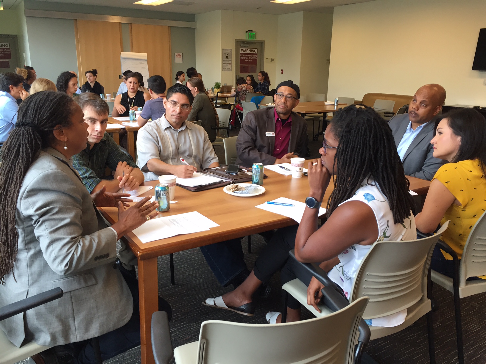 Working group members meeting at a table