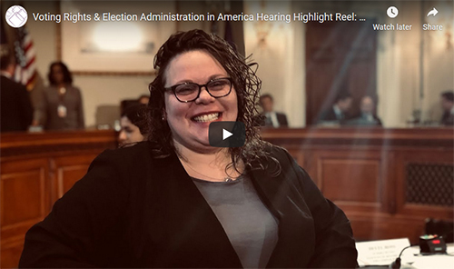 Image of Michelle Bishop standing in a Congressional hearing room.