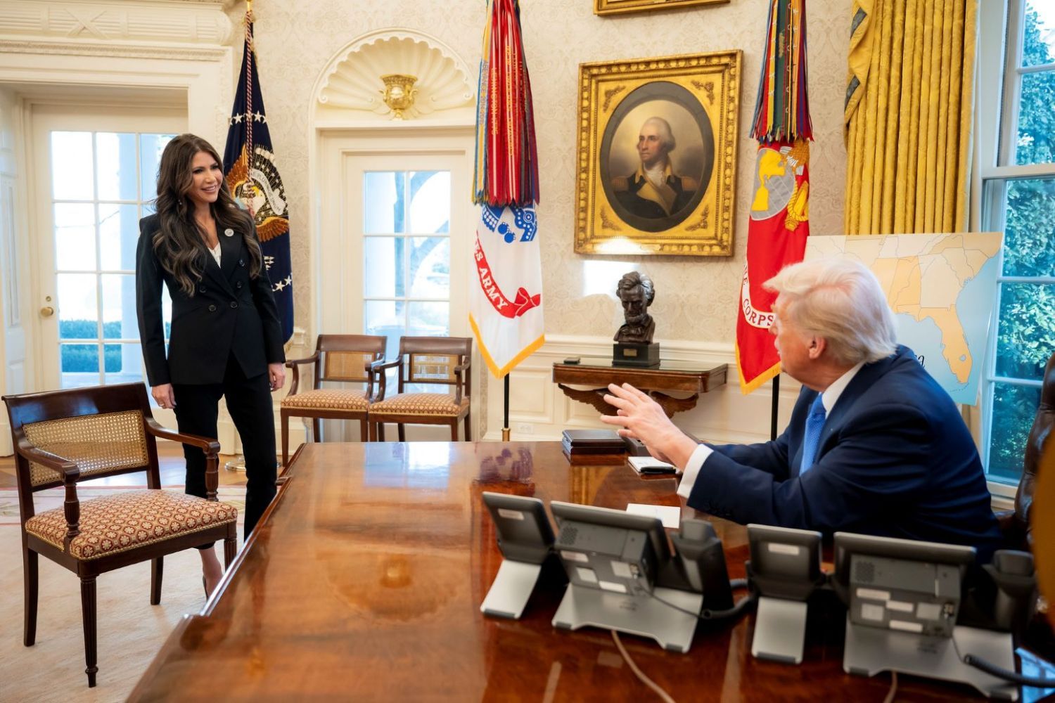 President Donald Trump and Homeland Security Secretary Kristi Noem in the Oval Office.