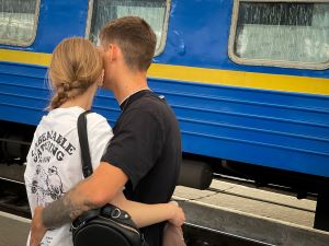 A couple says goodbye at a train station in Lviv, Ukraine.