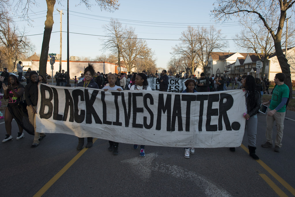 Image of people protesting with 