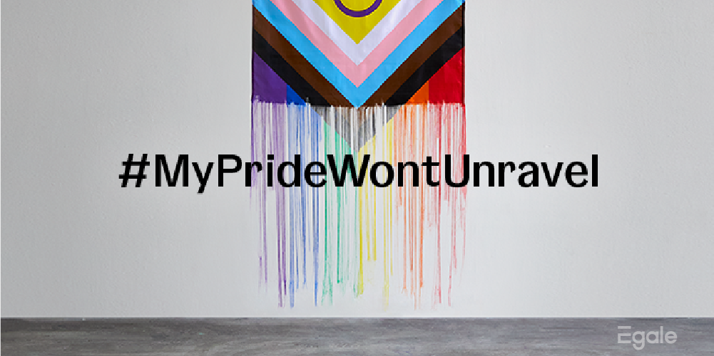 #MyPrideWontUnravel - progress flag hanging from top with threads unravelling