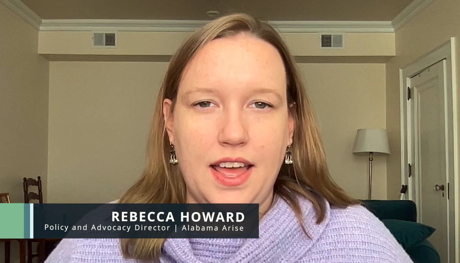 Robyn Hyden, a woman with long brown hair talks to the camera