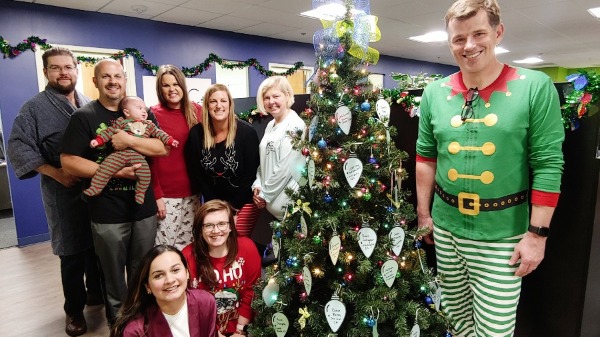Make your donation and we'll hang a light with your name on it on the OAC National Office holiday tree!