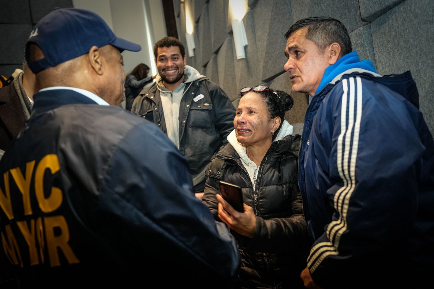 New York City Mayor Eric Adams meeting with asylum seekers.