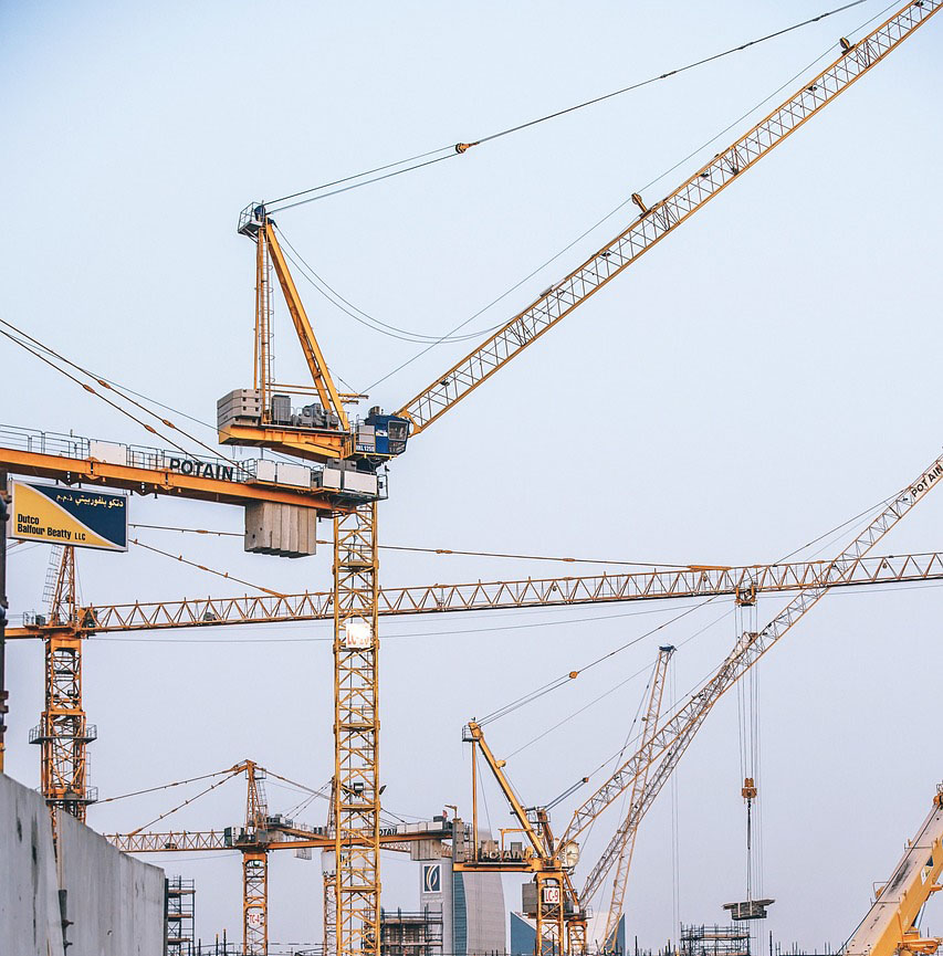 Image of cranes at construction site