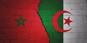 Paintings of the Algerian and Moroccan flags on a brick wall