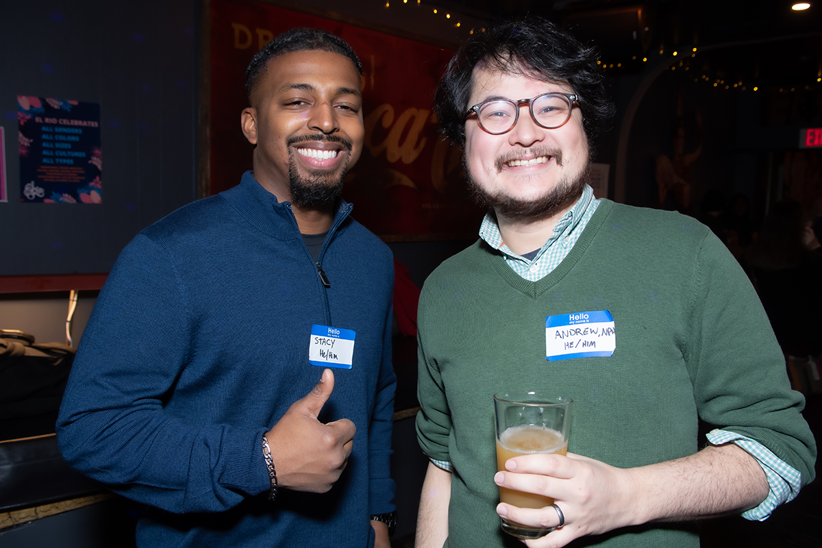 Two people smiling at a past NPH Member Party