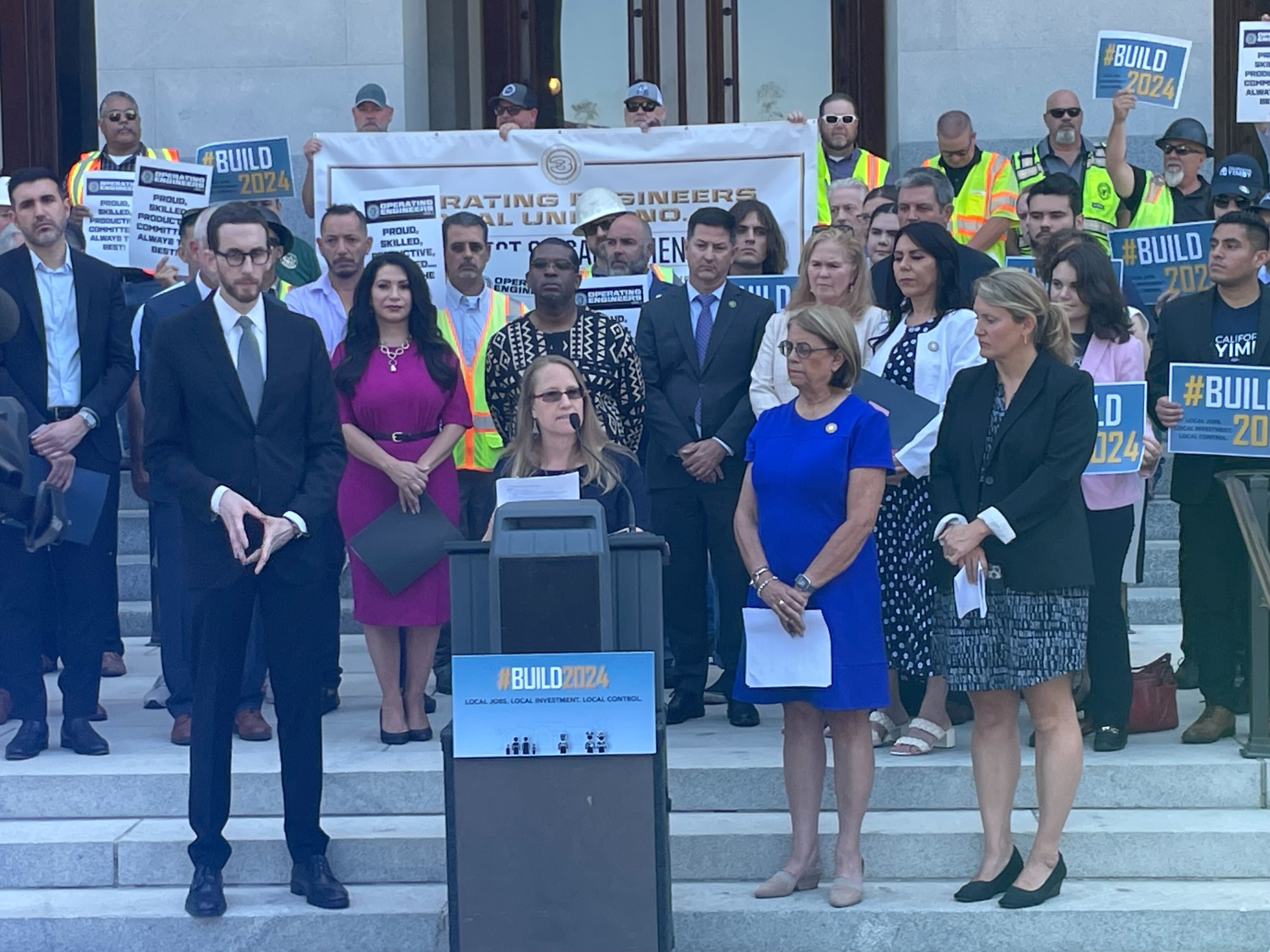 Amie speaking at ACA 1 rally