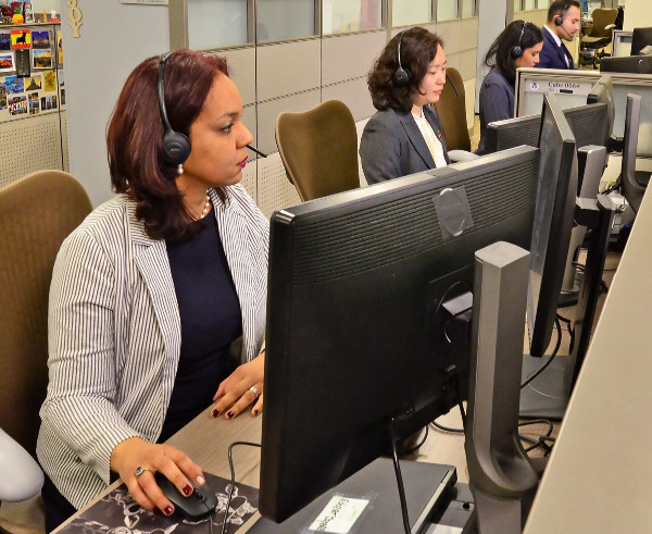 USCIS employees at work.