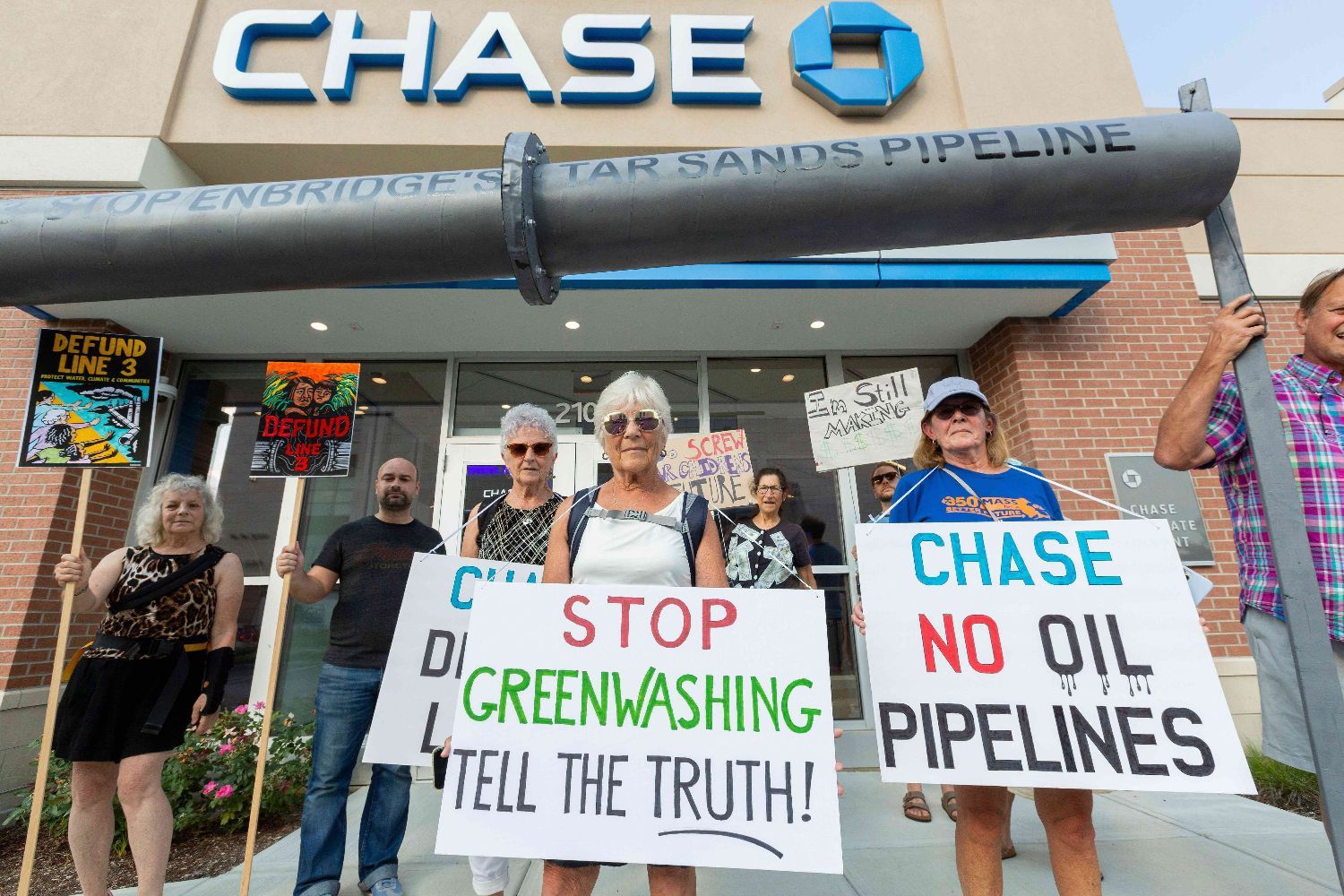 People protest Chase Bank funding climate chaos