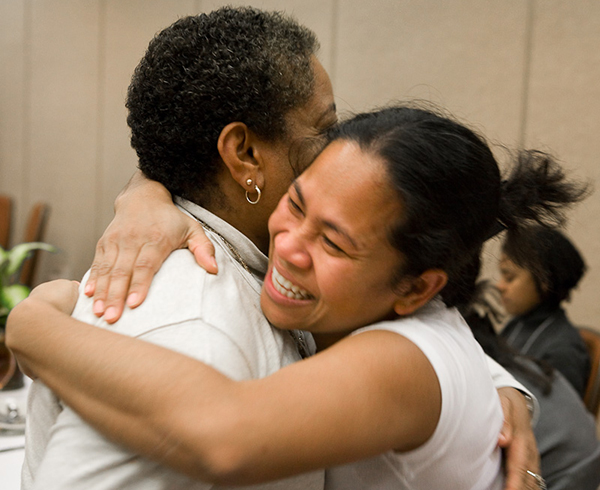 Two women hugging